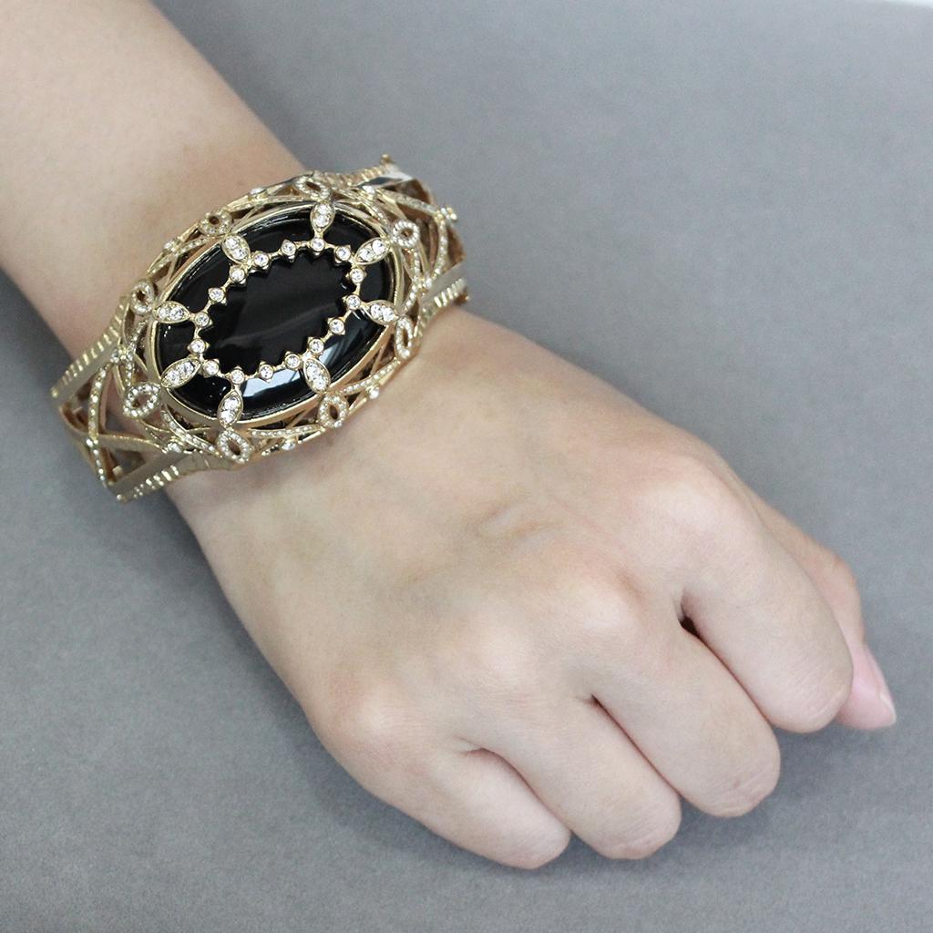 LO4349 - Gold Brass Bangle with Synthetic in Jet