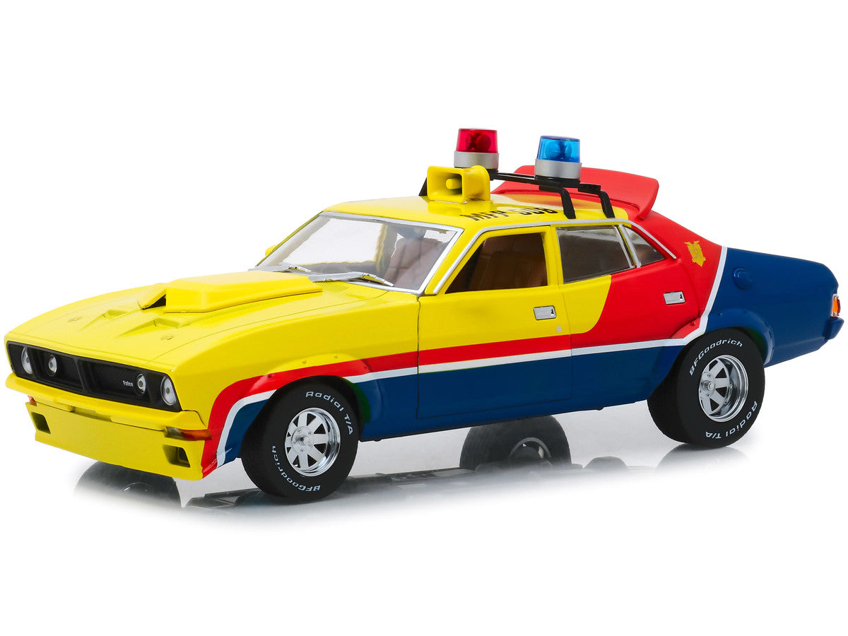 1974 Ford Falcon XB 4-Door Sedan RHD (Right Hand Drive) Yellow and Blue with Red Stripes "MFP 508" "First of the V8 Interceptors" (1979) Movie 1/18 Diecast Model Car by Greenlight