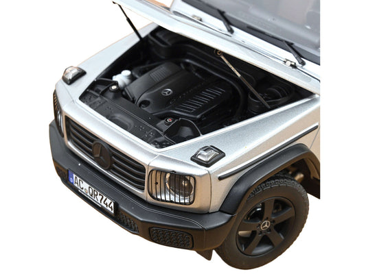 2024 Mercedes-Benz G-Class Professional Iridium Silver Metallic with Black Top and Roof Rack 1/18 Diecast Model Car by Norev