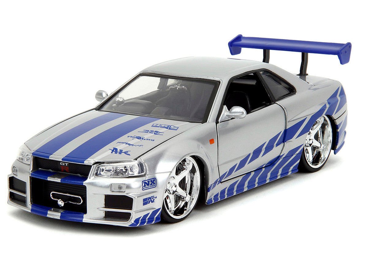 Brian's Nissan Skyline GT-R (R34) Silver Metallic with Blue Stripes and Suki's Honda S2000 Pink with Graphics Set of 2 Cars "Fast & Furious 25th Anniversary" "Fast & Furious" Series 1/24 Diecast Model Cars by Jada