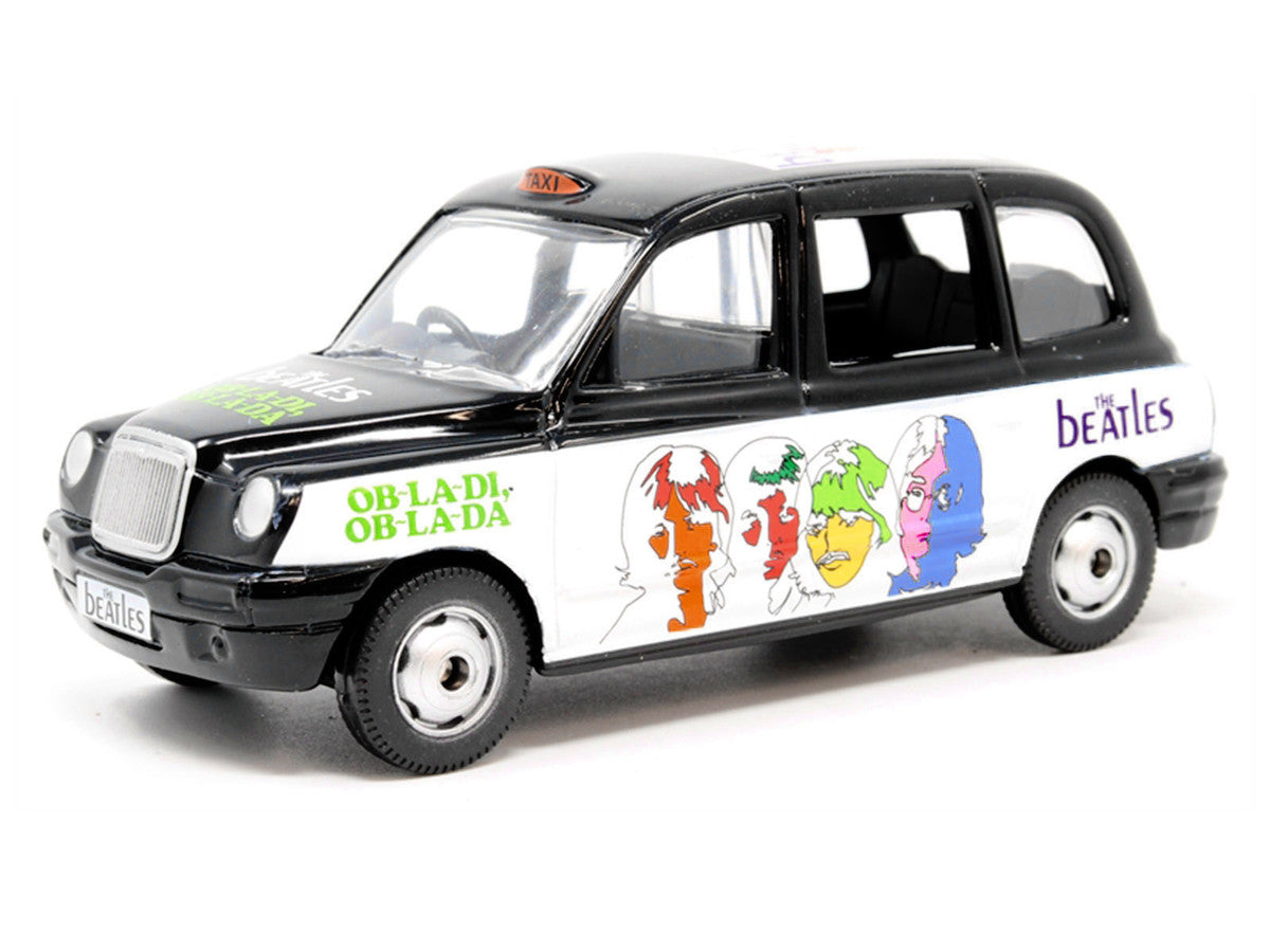 The Beatles London Taxi RHD (Right Hand Drive) "Ob-La-Di Ob-La-Da" Black and White with Graphics Diecast Model by Corgi
