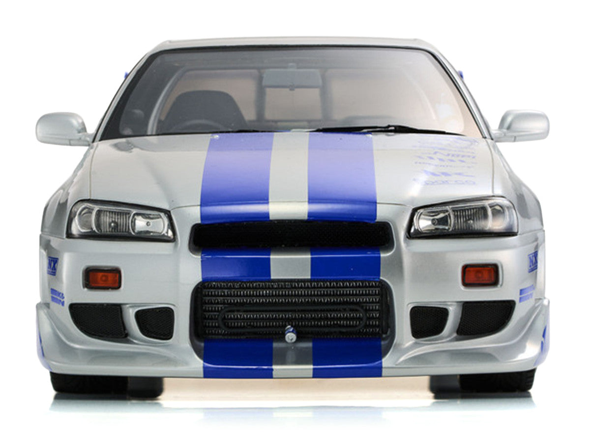 Nissan Skyline GT-R (R34) RHD (Right Hand Drive) Silver Metallic with Blue Graphics "2 Fast 2 Furious" (2003) Movie 1/12 Model Car by Kyosho