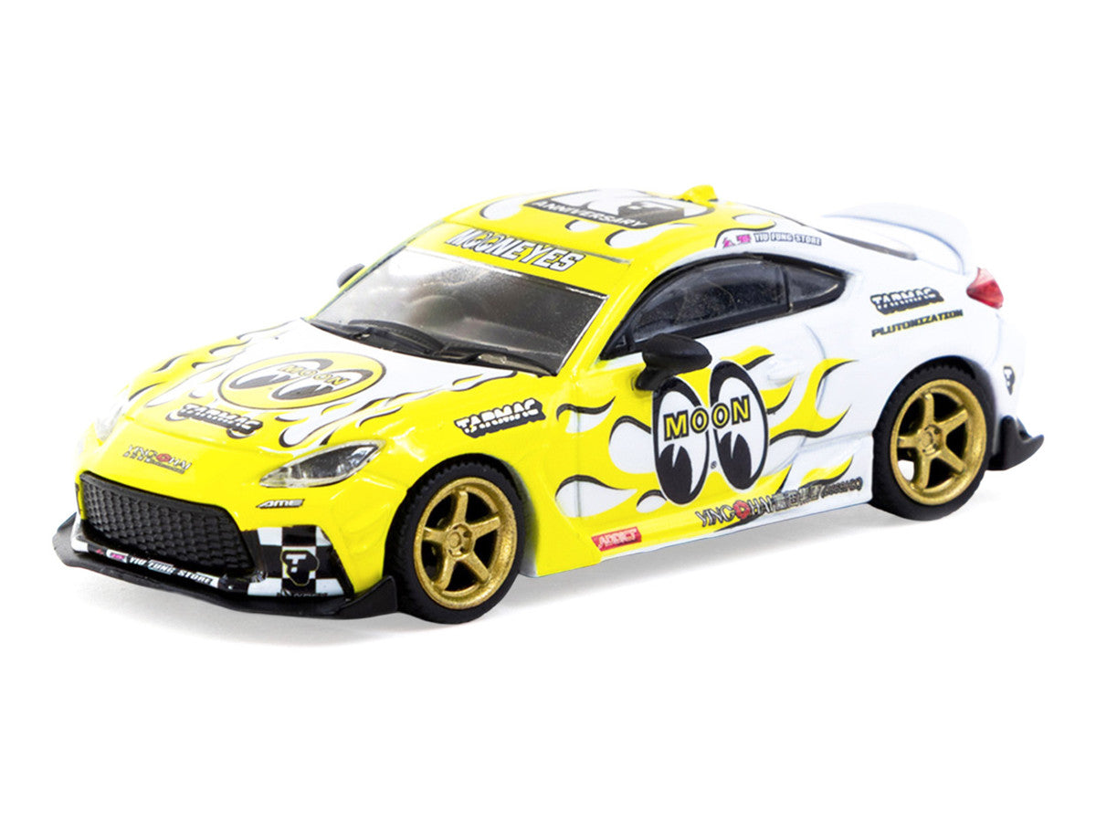 Toyota GR86 RHD (Right Hand Drive) "MoonEyes" White with Yellow Flames and Graphics "Global64" Series 1/64 Diecast Model by Tarmac Works
